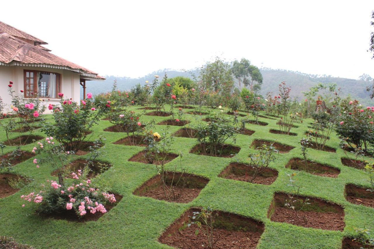 Tea County Hotel Munnar Buitenkant foto