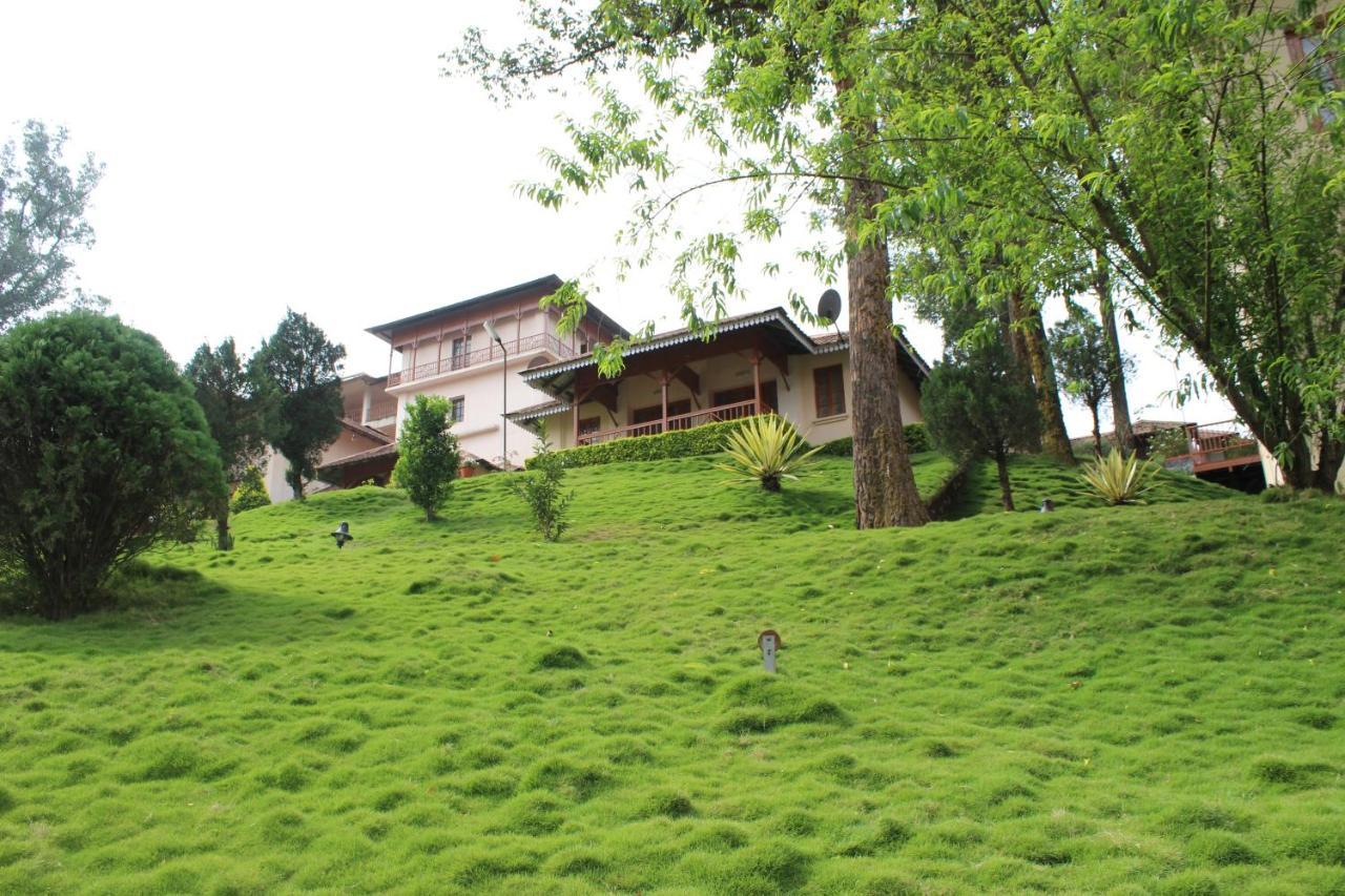 Tea County Hotel Munnar Buitenkant foto