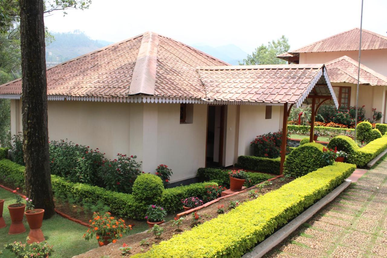 Tea County Hotel Munnar Buitenkant foto