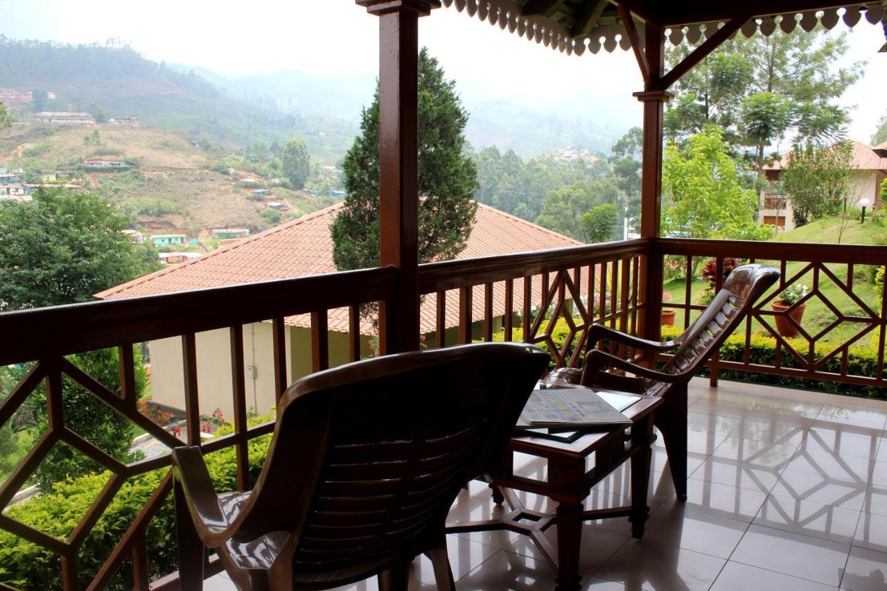 Tea County Hotel Munnar Buitenkant foto