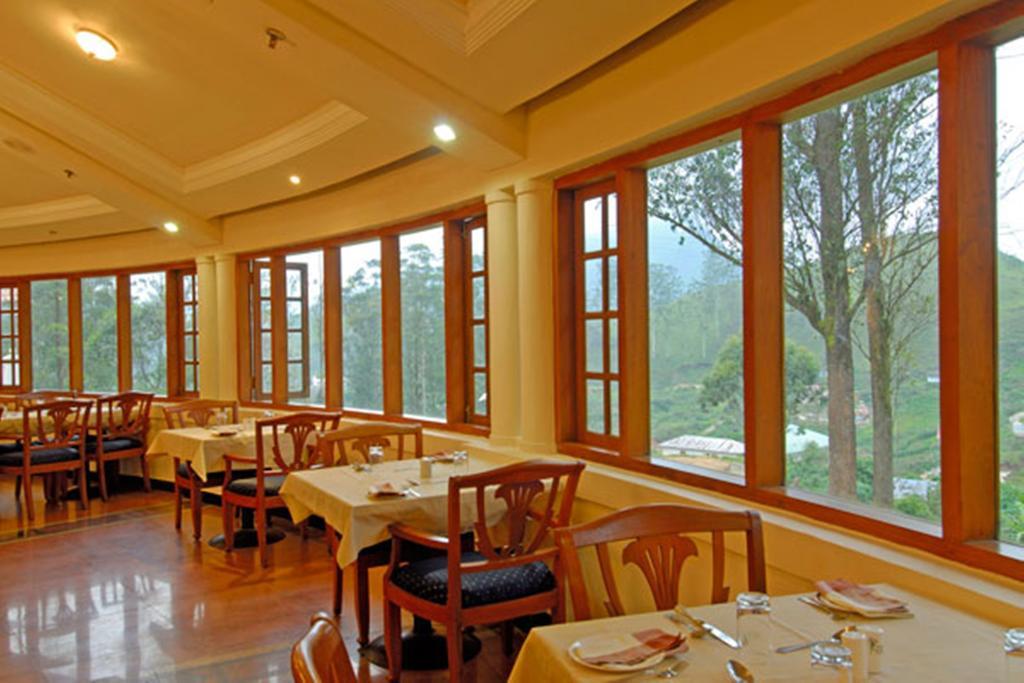 Tea County Hotel Munnar Buitenkant foto